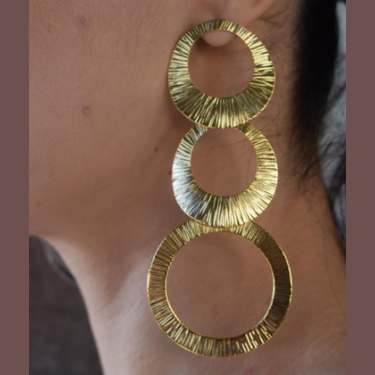 Kyklades Earrings – Greek Hammered Jewelry – Available in 18K Gold, Silver, and Rose Gold Plated. Handmade cascading hammered circles inspired by the Cycladic islands and Aegean heritage.