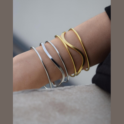 Ocean Bracelet – Greek Hammered Jewelry – Available in 18K Gold, Silver, and Rose Gold Plated. Wavy hammered design inspired by Okeanos and the eternal sea.