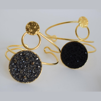 Handmade open cuff bracelet with crystals-studded disc inspired by the Milky Way, available in gold, silver, or rose gold plating.