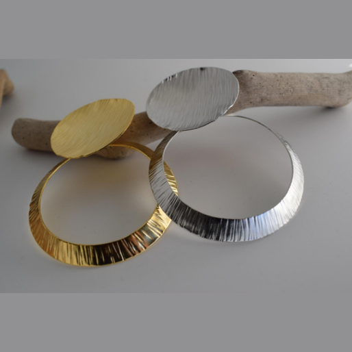 Krateras Earrings – Greek Hammered Jewelry – Available in 18K Gold, Silver, and Rose Gold Plated. Hammered circle design inspired by Greek volcanic craters.