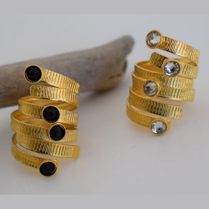 Aetheras Ring – Greek Hammered Jewelry – Available in 18K Gold, Silver, and Rose Gold Plated With Crystal. Spiral hammered design, adjustable, hypoallergenic, handcrafted.