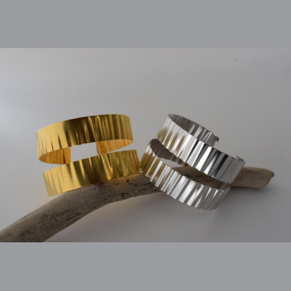 Rythmos Bracelet – Greek Hammered Jewelry – Available in 18K Gold, Silver, and Rose Gold Plated. Hammered vertical lines inspired by rhythm and ancient columns.