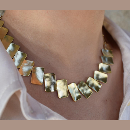 Handmade hammered necklace with rectangular gold-plated plates inspired by the poetic elegance of gold in ancient Greek culture.