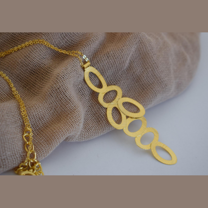 Rhodes necklace in handmade Greek hammered jewelry design, available in gold plated and silver plated finishes.