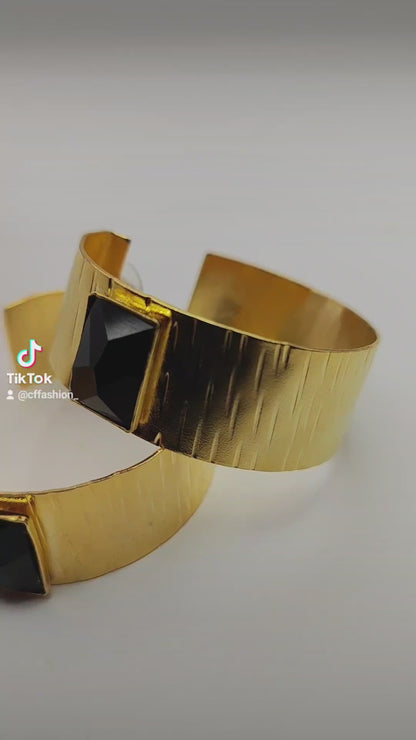  Inspired by Ionian columns and sea. 18K gold, silver, crystals